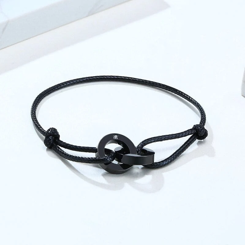 Armband Mit Kordel Und Verschlungenen Ringen