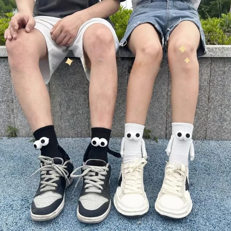 Magnetische Socken, Die Die Hand Halten