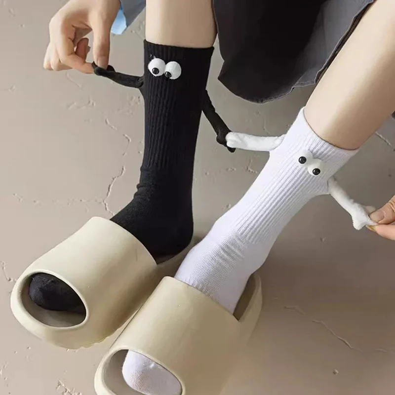 Magnetische Socken, Die Die Hand Halten