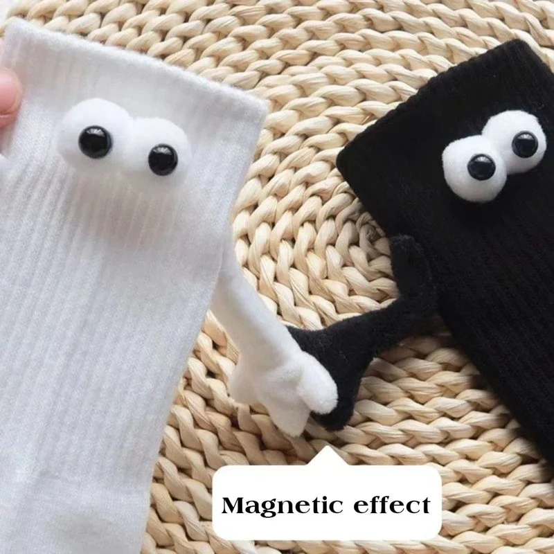 Magnetische Socken, Die Die Hand Halten
