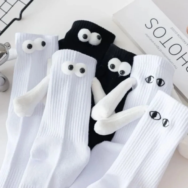 Magnetische Socken, Die Die Hand Halten