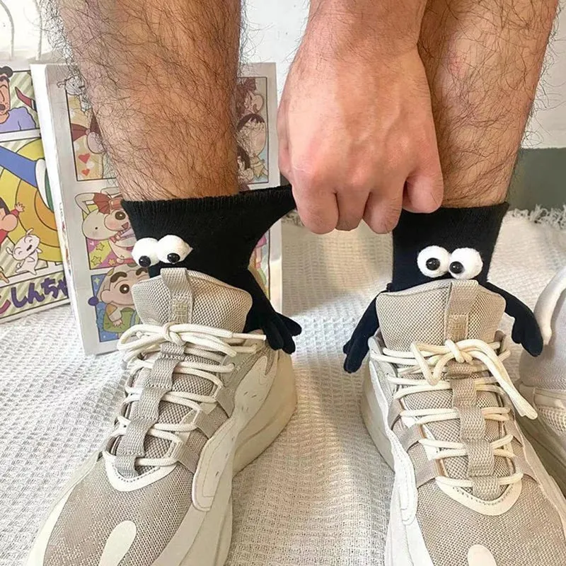 Magnetische Socken, Die Die Hand Halten