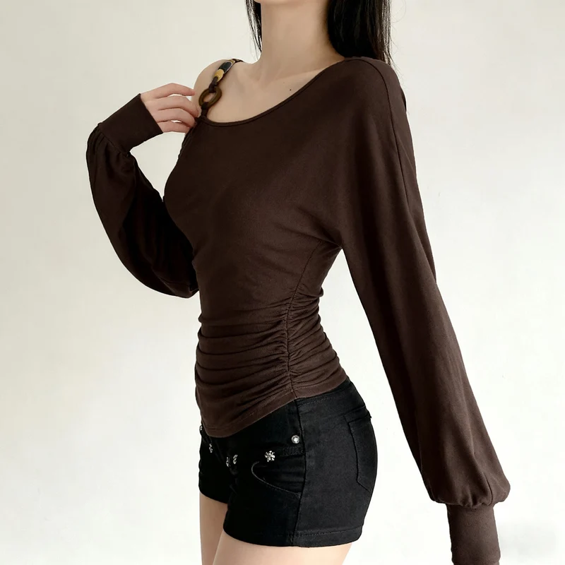 Ruched long sleeve o ring beaded top