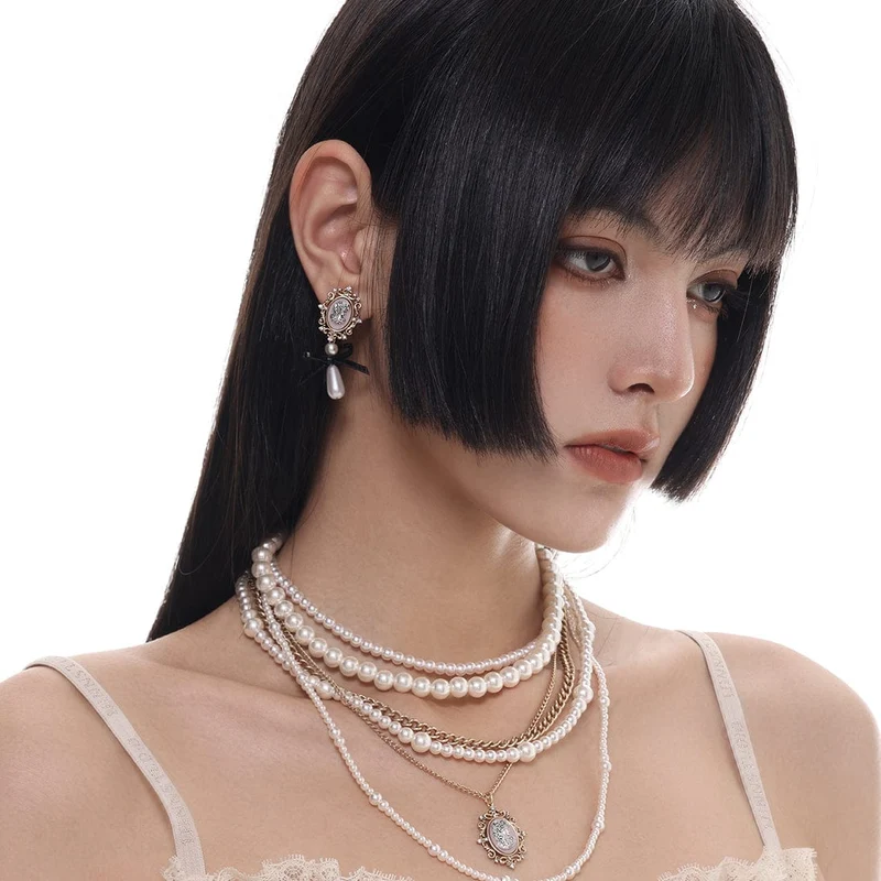 Gothic-Ohrringe mit geprägter Schleife für Damen
