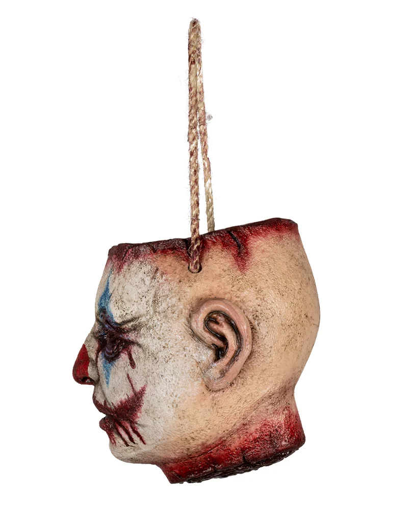 Abgetrennter Clowns Kopf als Tasche