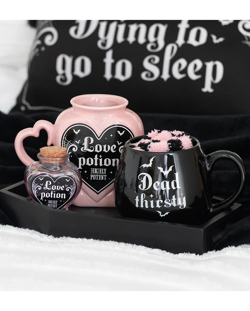 Pinker "Love Potion" Kaffeebecher in Herzform