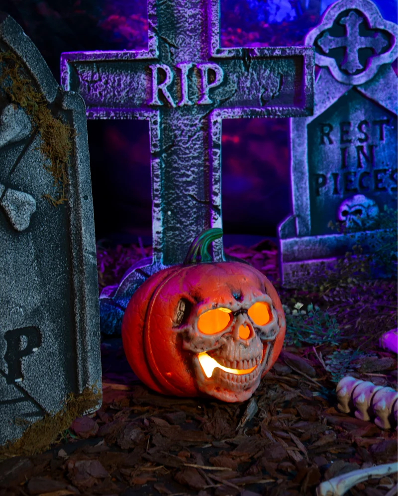 Halloween Kürbis mit beleuchteter Totenkopf Fratze 21cm
