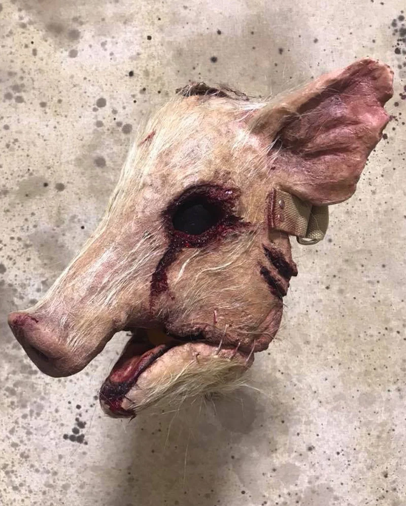 Behaarte blutige Schweinekopf Maske