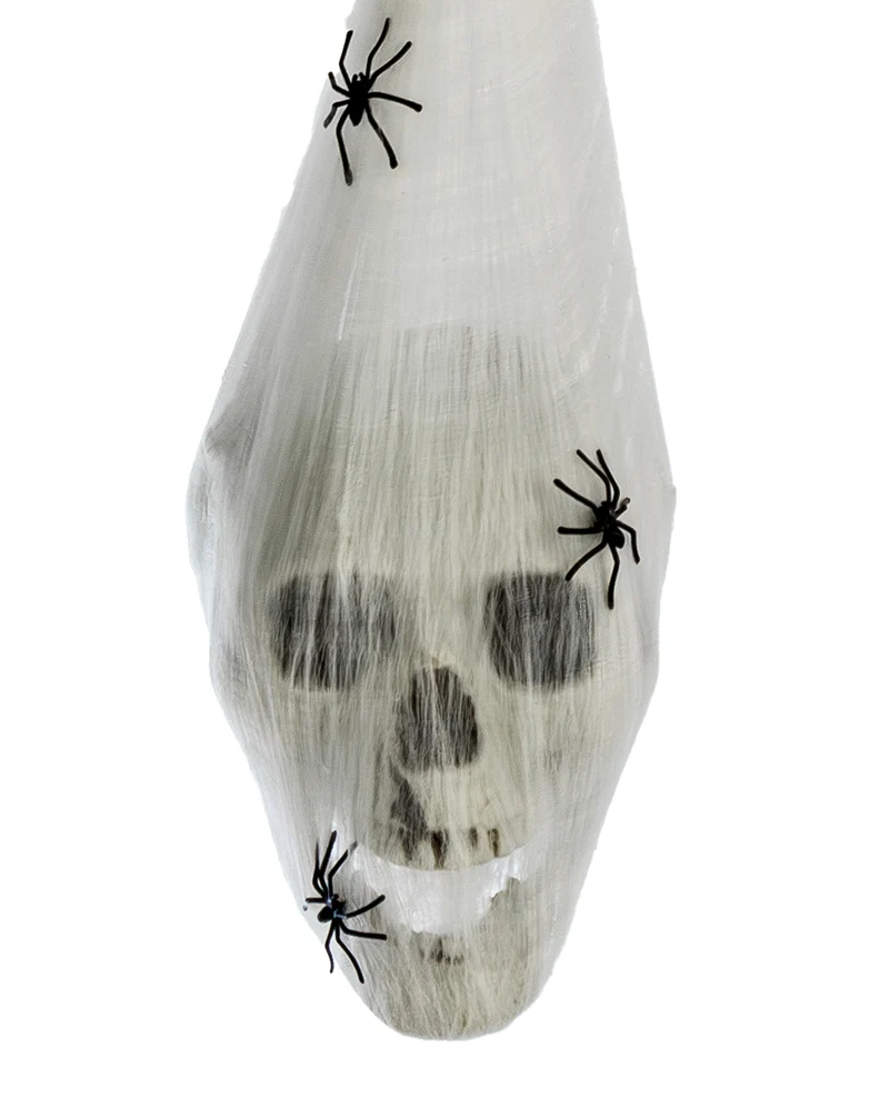 Totenkopf im Spinnenkokon mit Leuchtaugen